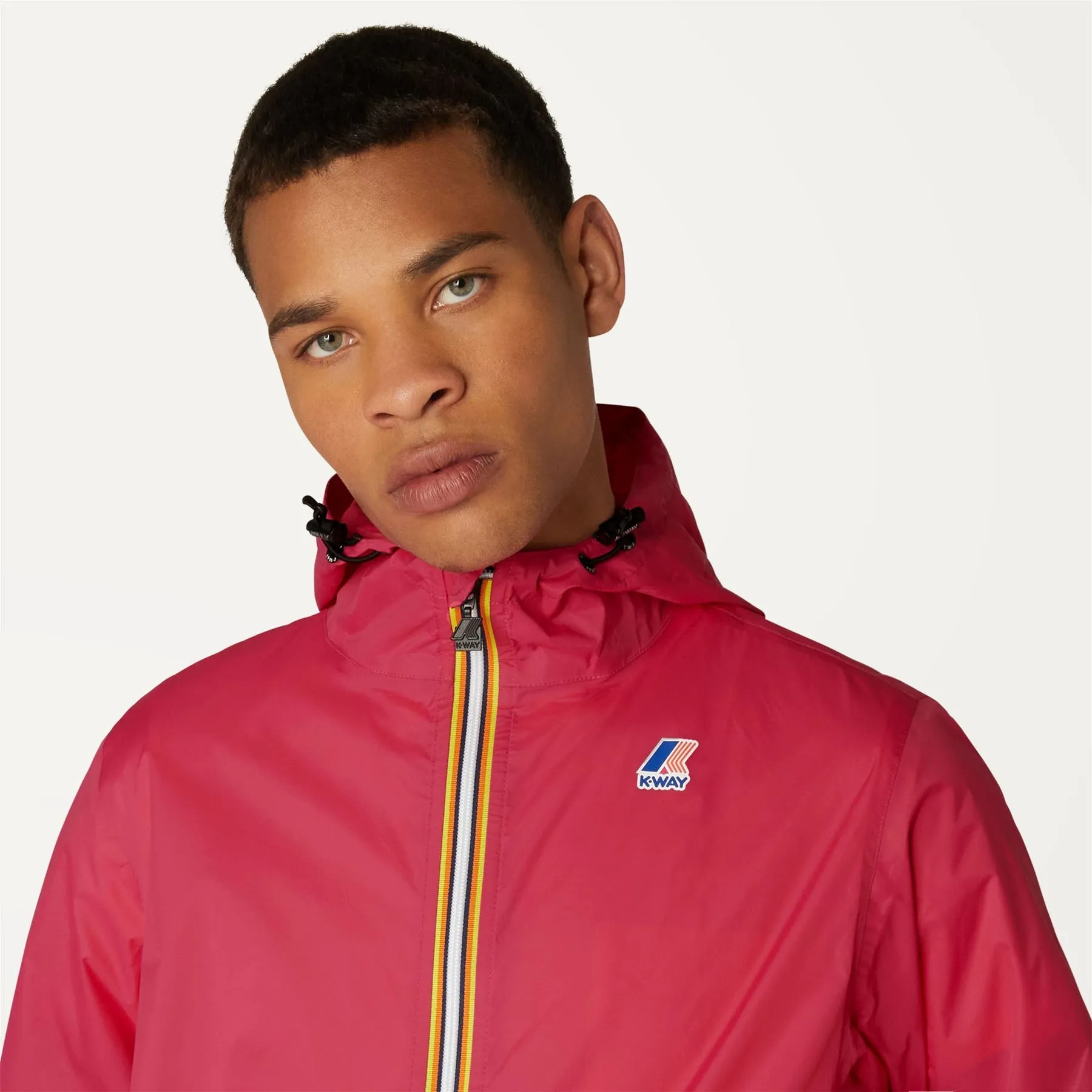 Claude - Unisex Packable Full Zip Waterproof  Rain Jacket in Fuchsia Magenta